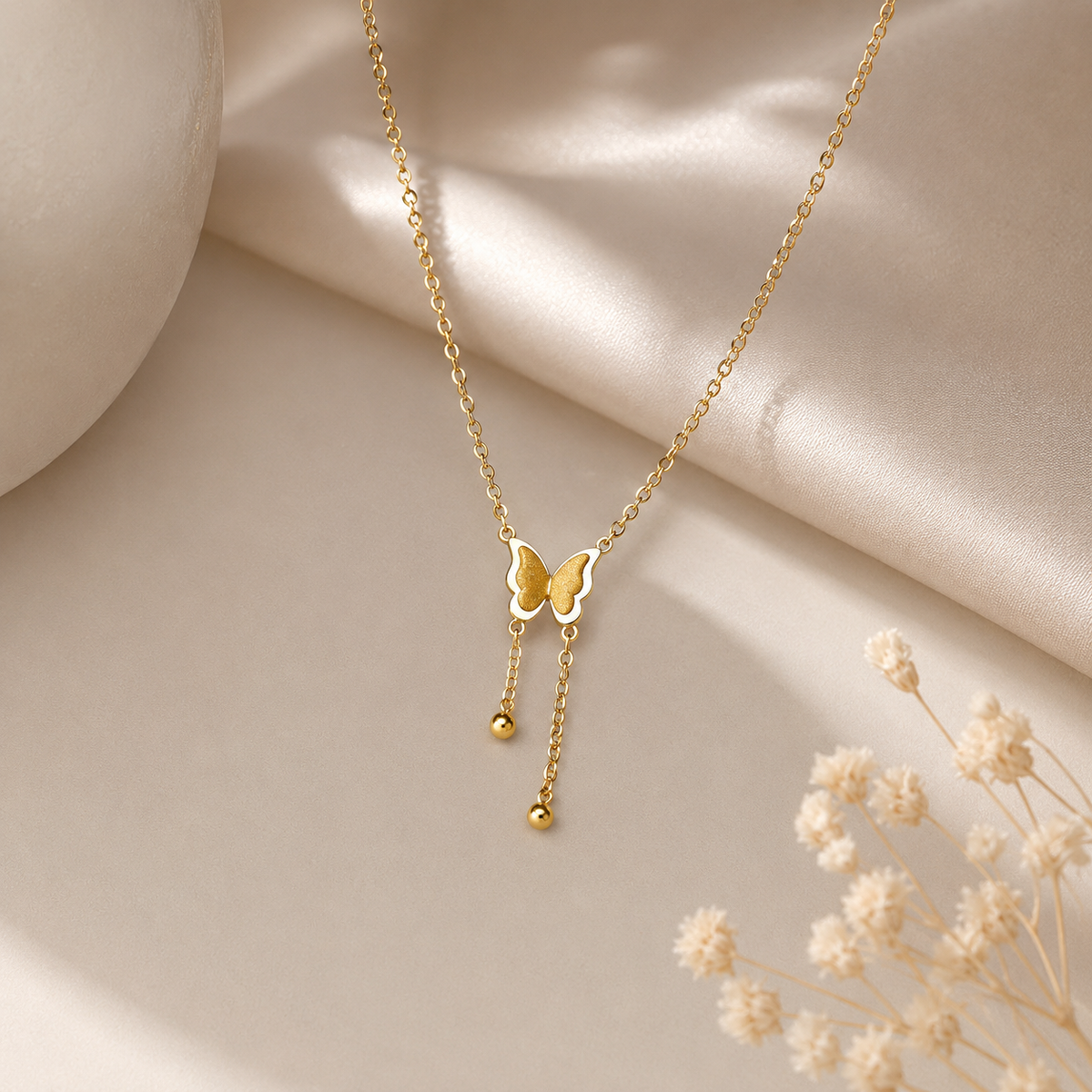 Collier papillon doré à pampilles NÉVORA